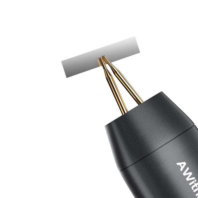 Close-up of brass welding electrodes on black handheld spot welder