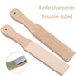 Double-sided leather knife sharpener with two tan leather faces and wooden handle