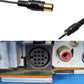 Audio modification cable connected to dashboard AUX ports; 3.5mm plug visible