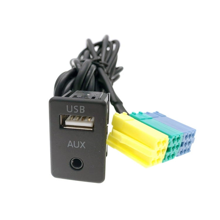 AUX and USB car audio input module with black housing and cable