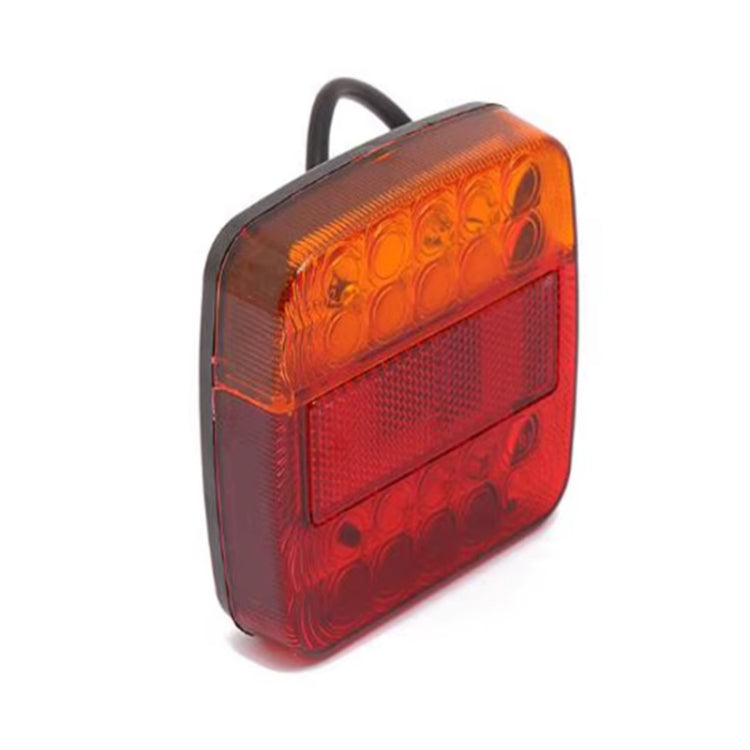 Square LED trailer brake tail light with amber and red lens, black housing