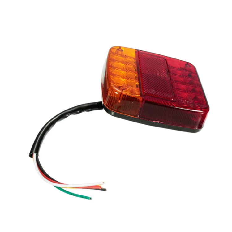 Square trailer LED tail light with wire harness, amber top and red lens