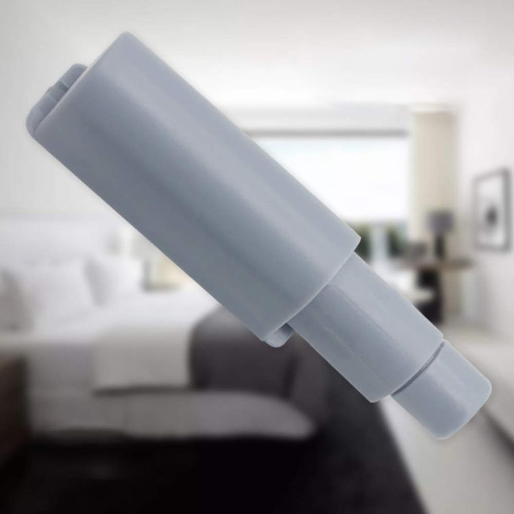 Magnetic cabinet door bouncer attached to cabinet door, thick short grey bumper