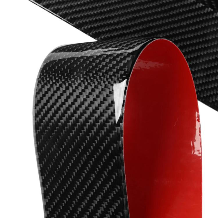 Close-up of B-pillar decorative sticker, black carbon-fiber texture with red edge