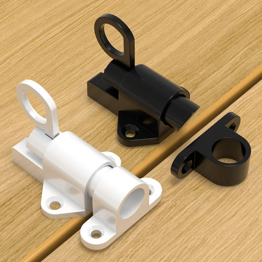 White and black latch assemblies with mounting brackets on a wooden door