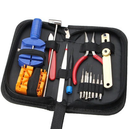 Watch repair tool kit in black zip pouch with blue, red, and metal tools