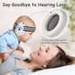 Baby wearing white and black striped earmuff headband with padded ear cups