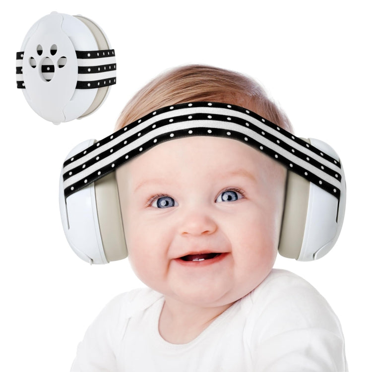Baby close-up wearing white earmuff ear cups with black striped headband