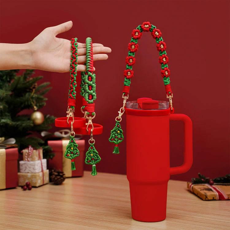 Christmas rope-knit hand strap with red and green trim, gold clips, and tree charm