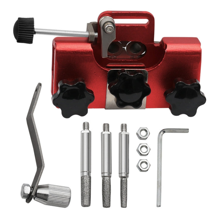 Red handheld chain sharpener with adjustable guide bar and crank handle.