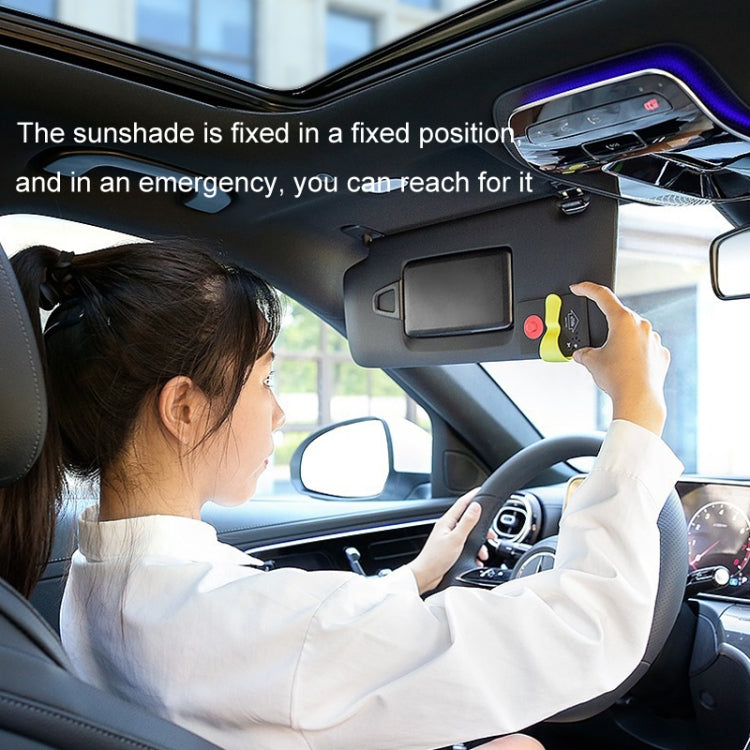 Emergency car window hammer card mounted near sun visor with hand reaching