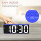 Blue LED bedside alarm clock with snooze controls and segmented time display