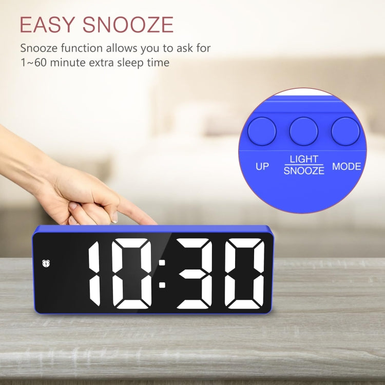 Blue LED bedside alarm clock with snooze controls and segmented time display