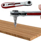 Ratcheting socket wrench driving a screw on a wooden board, red and silver