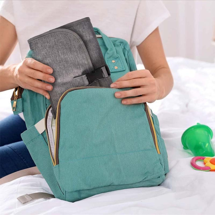 Teal and gray waterproof diaper changing pad bag with front pocket and strap