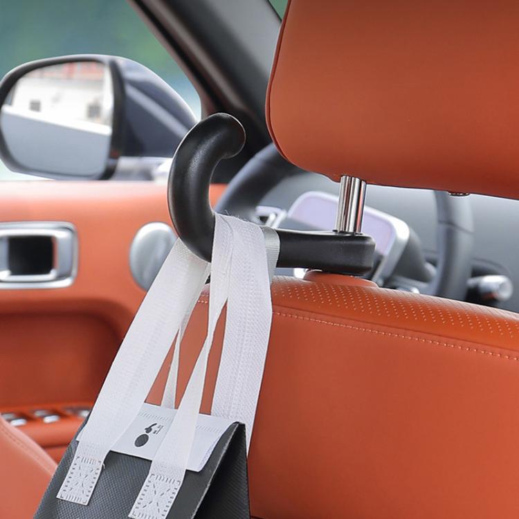 Black seat hook holding two seatbelt straps on rear headrest posts