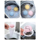Set of washing machine hair lint catcher balls and mesh bags in multiple colors, shown in use