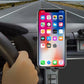 Car phone mount on air vent holding a smartphone in landscape position