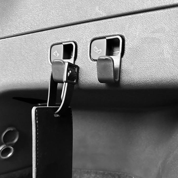 Embedded trunk hooks with hanging strap and clamp mount on interior panel