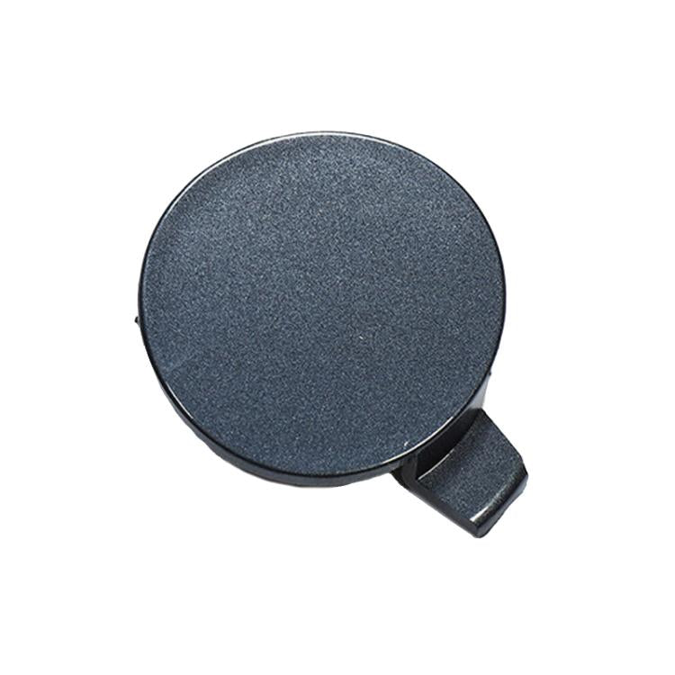 Gray round front towing hook cover with hinged tab