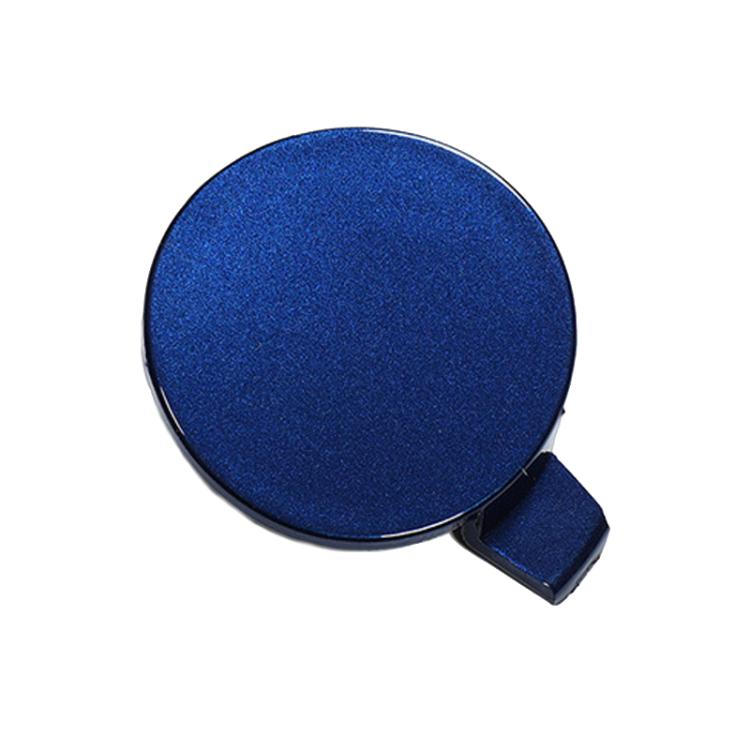 Blue round front towing hook cover with hinged tab