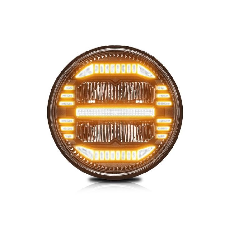 7-inch round LED headlight with amber light bar and chrome grille bezel