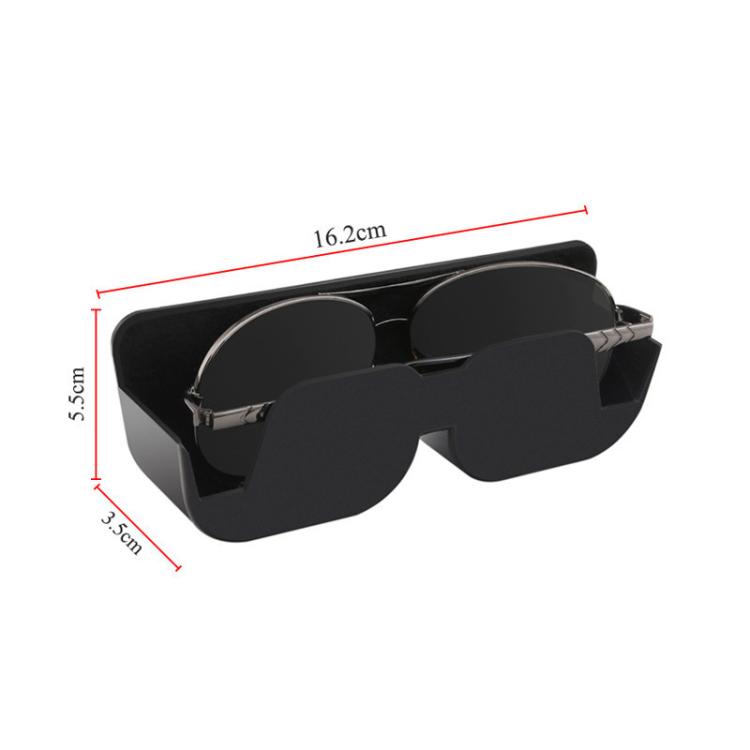 Adhesive car glasses case in black, shown with size measurements