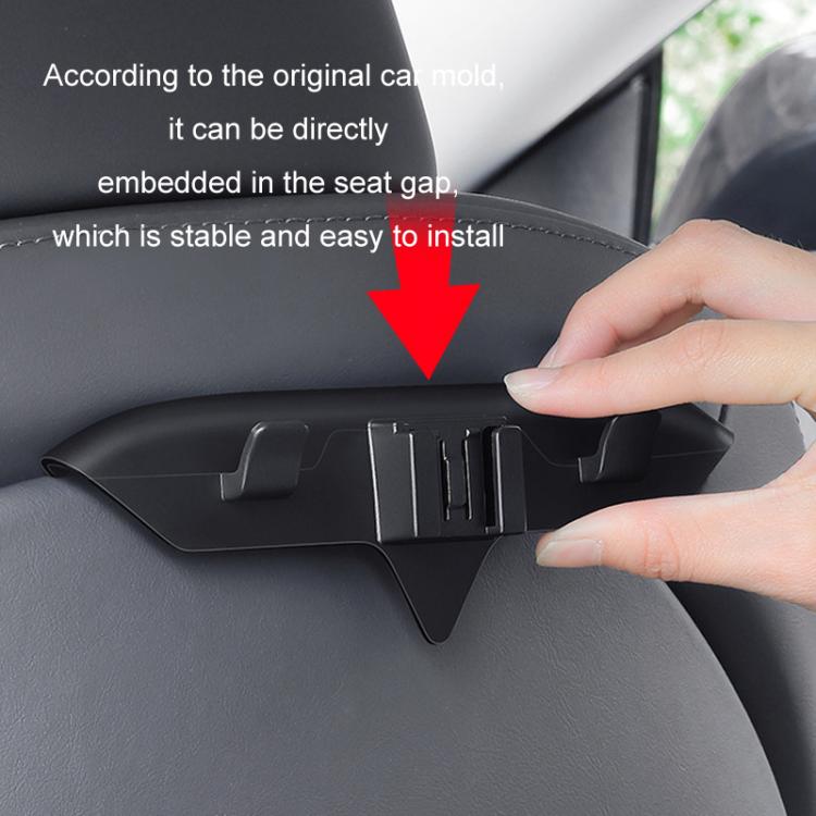 Triple rear seat hook being installed in the seat gap by hand