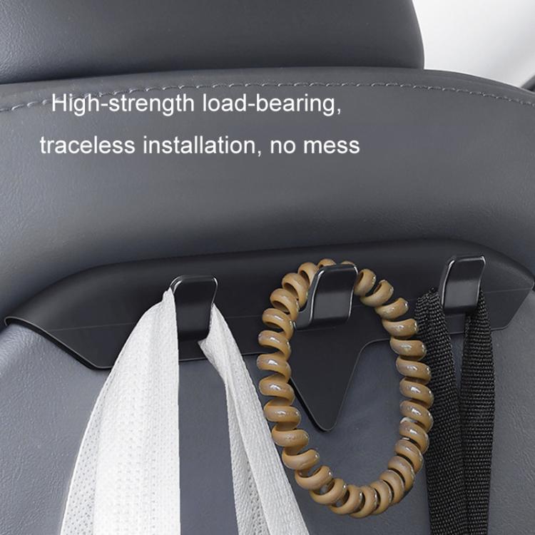 Triple rear seat hooks holding a bead necklace and two hanging straps