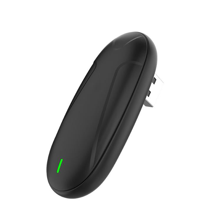 Black oval wireless CarPlay adapter with green status light and side connector pins