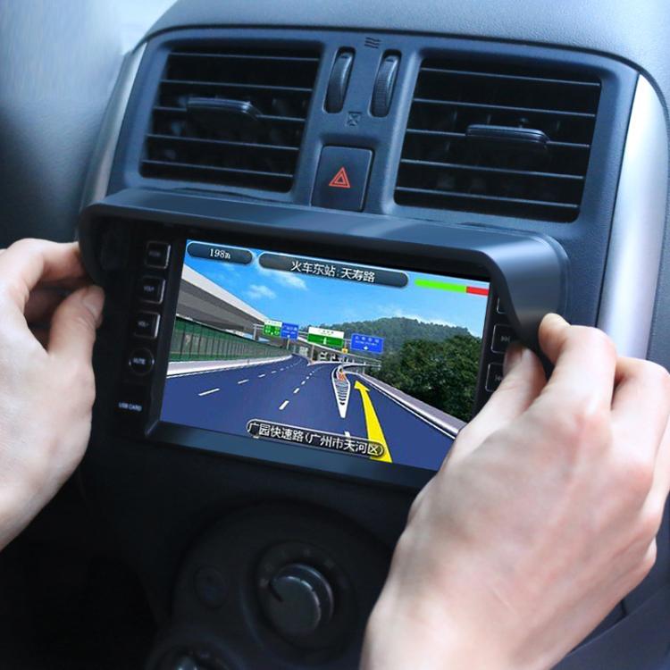 Universal sun visor for car navigation display being fitted on dashboard with navigation screen