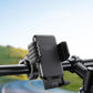 Black shock-absorbing phone holder mount on motorcycle handlebar