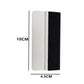 Two-sided felt scraper pad, white and black, approx 10 cm by 4.5 cm