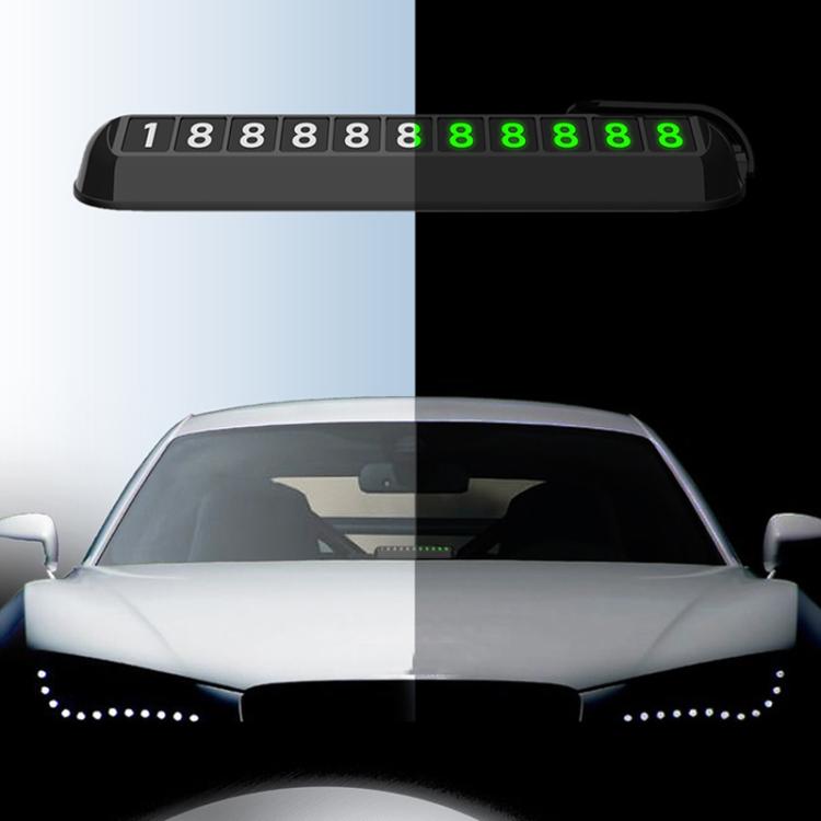Car temporary parking number plate with green-lit digits on black housing