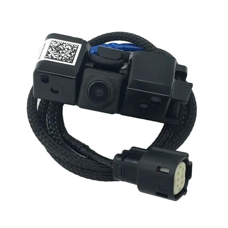 Rear view camera module with QR label, black housing, and cable