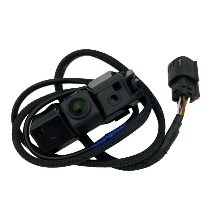 Backup camera assembly with lens, black housing, and multi-wire connector