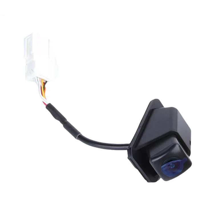 Rear view backup camera module with attached wiring harness and blue lens