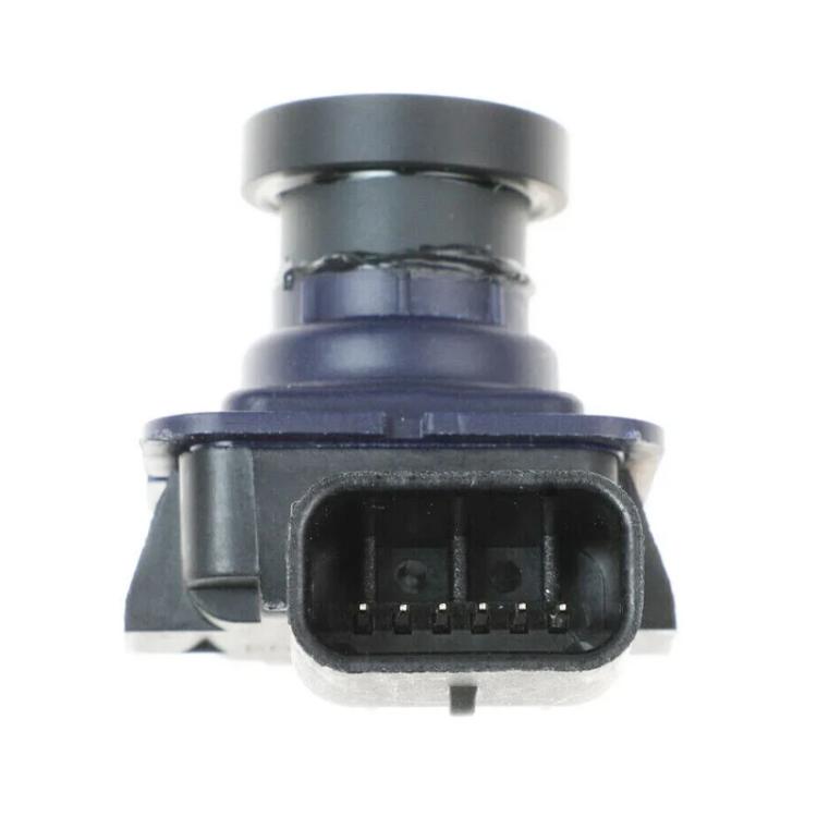 Rear view backup camera module front view with connector pins under lens housing