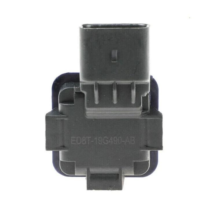 Rear view backup camera module with rear connector and dark plastic casing