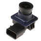Rearview camera module with black lens and blue faceplate, plug connector attached