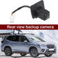 Rear view backup camera with mounting bracket, cable, and white connector