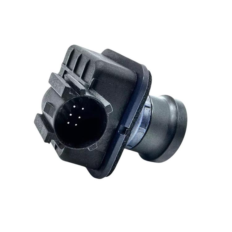 Camera mounting housing with circular lens and electrical connector port