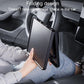 Folding tray table extended downward from center console, dark gray surface