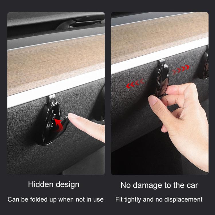 Foldable black concealed glove box hook tucked in a slot when not in use