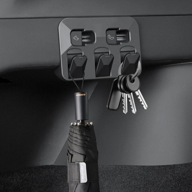 Trunk hook key holder set, dark gray folded panel with keys on a hanging ring