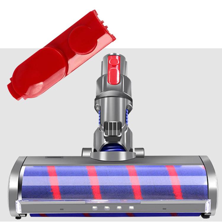 Red long vacuum switch button with spring, shown installed on vacuum head