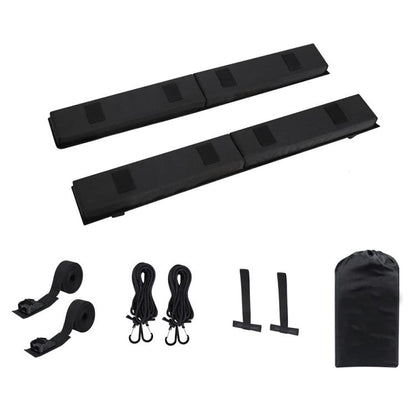 Black surfboard roof rack padding set with two strap-secured cushions and tie cords