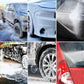 Car covered in white soap foam across body, wheels, and rear panel