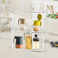 Three-tier clear acrylic corner storage table with kitchen jars on glass-style shelves