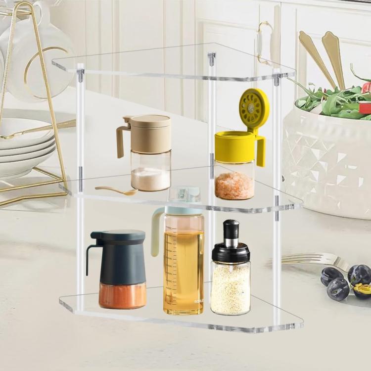 Three-tier clear acrylic corner storage table with kitchen jars on glass-style shelves